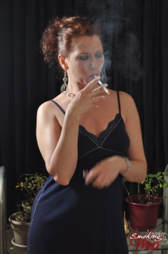 Sexy Smoking Mina in blue dress stripping