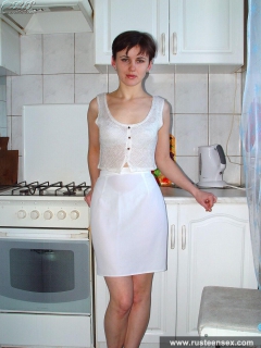Young brunette's kitchen striptease - N