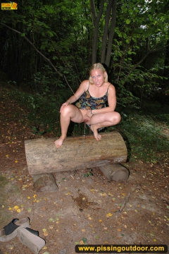 Teen blonde pissing on the forest bench - N