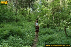 Teen brunette pissing outdoor in the forest - N