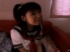 pigtailed-japanese-schoolgirl-has-a-vibrator-taking-her-sli