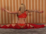 Sexy belly dancer in a red dress