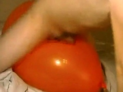 Big inflatable orange balloon humping cum