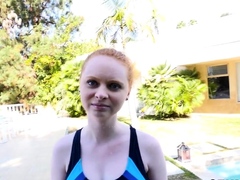 Teen redhead in swimsuit