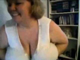 Mature Nancy playing with her boobs on webcam