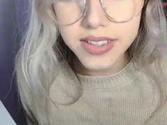 Busty Blonde Chick with glasses playing around