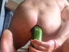 filling white ass with cucumber